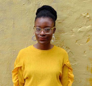 lady in yellow top